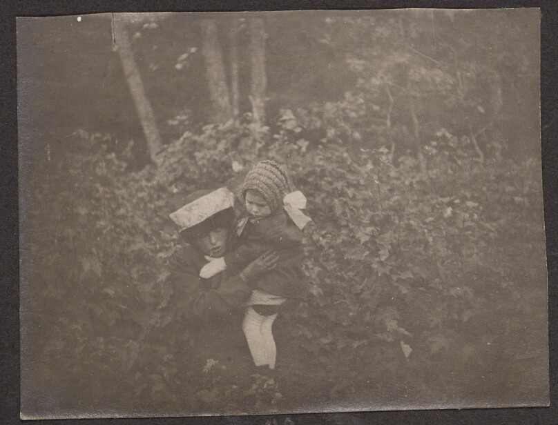 [Woman and child hugging]
