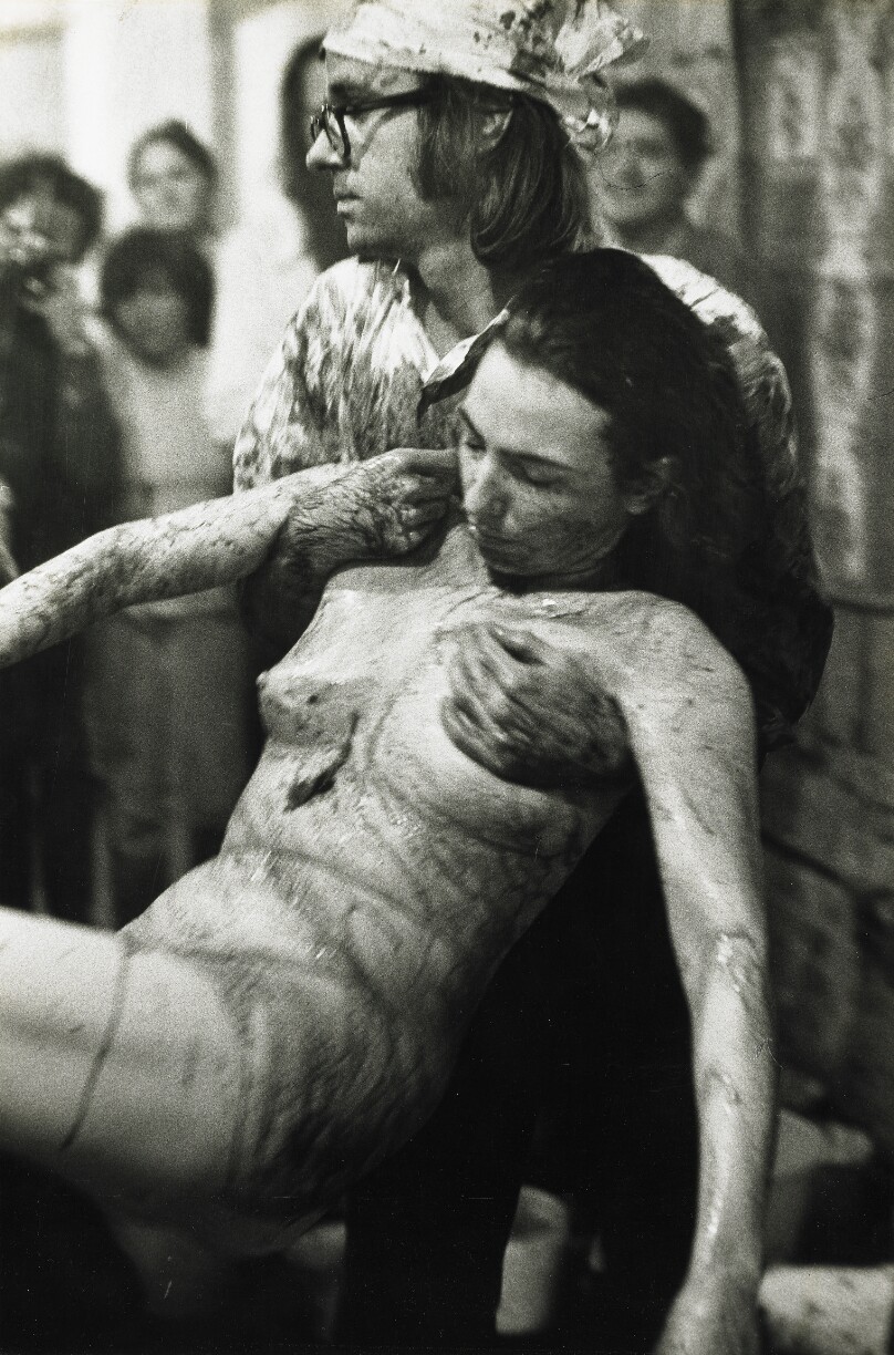 Charlotte Moorman carried by Jon Hendricks in Performance by Nitsch