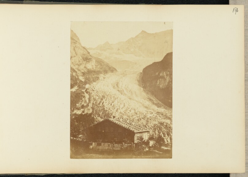 [House and mountain pass]
