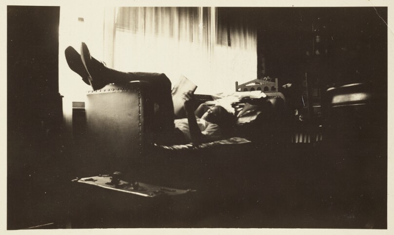 [Reading with available window light]
