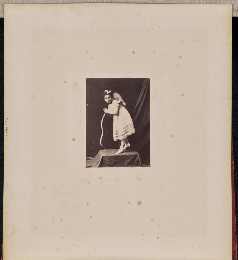 [Portrait of a little girl as Cupid]