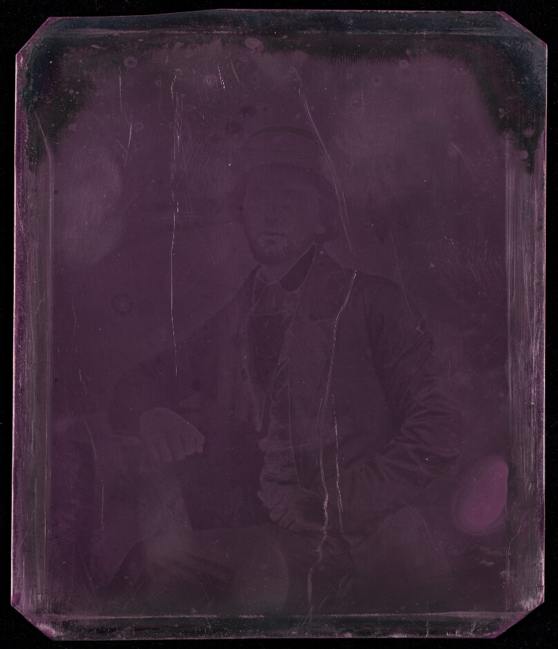 [Portrait of a Seated Man in Wide-Brimmed Hat]