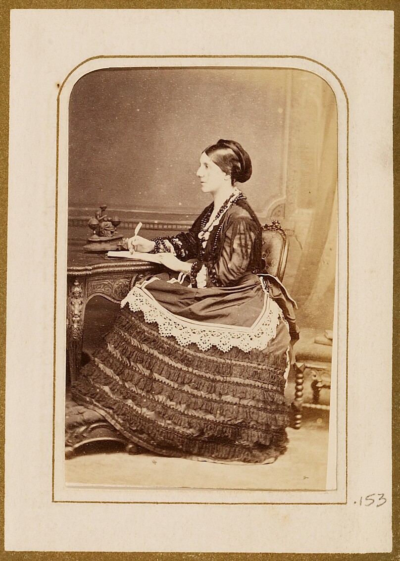 [Portrait of a woman writing]