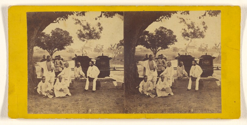 Rev. C.F. Preston and Friends, on the Parade Ground, Canton. Showing north-east Gate of City Wall in the distance.