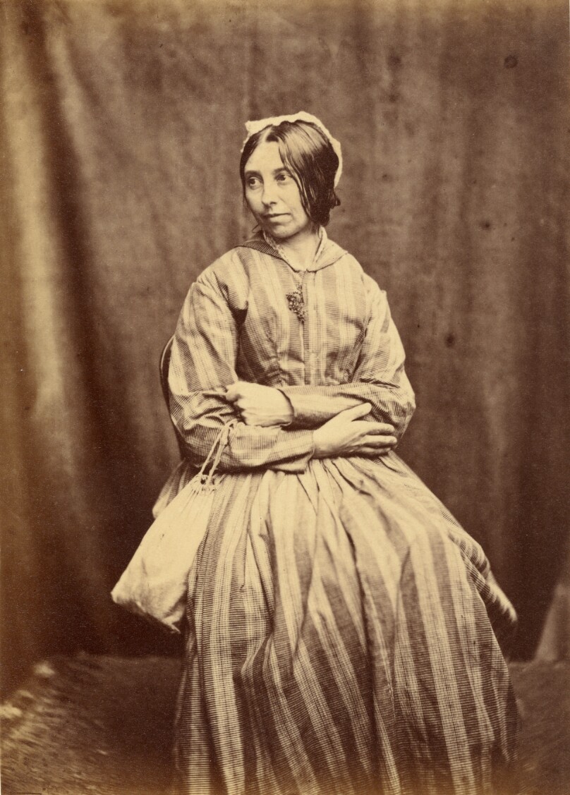 [Seated Woman With a Purse]