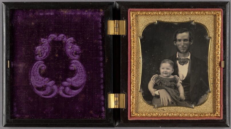 Portrait of a Father and Smiling Child