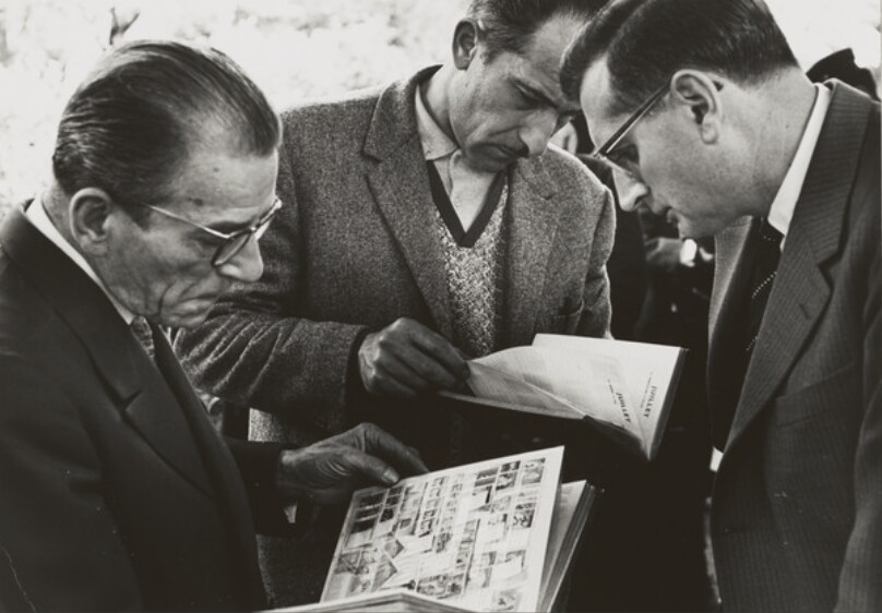 Men Looking at Books, Trading Stamps on Street, Paris, France