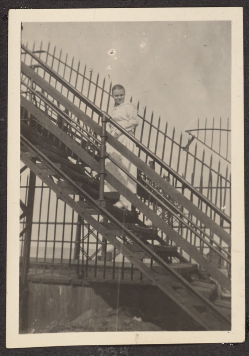 [Woman on a staircase]