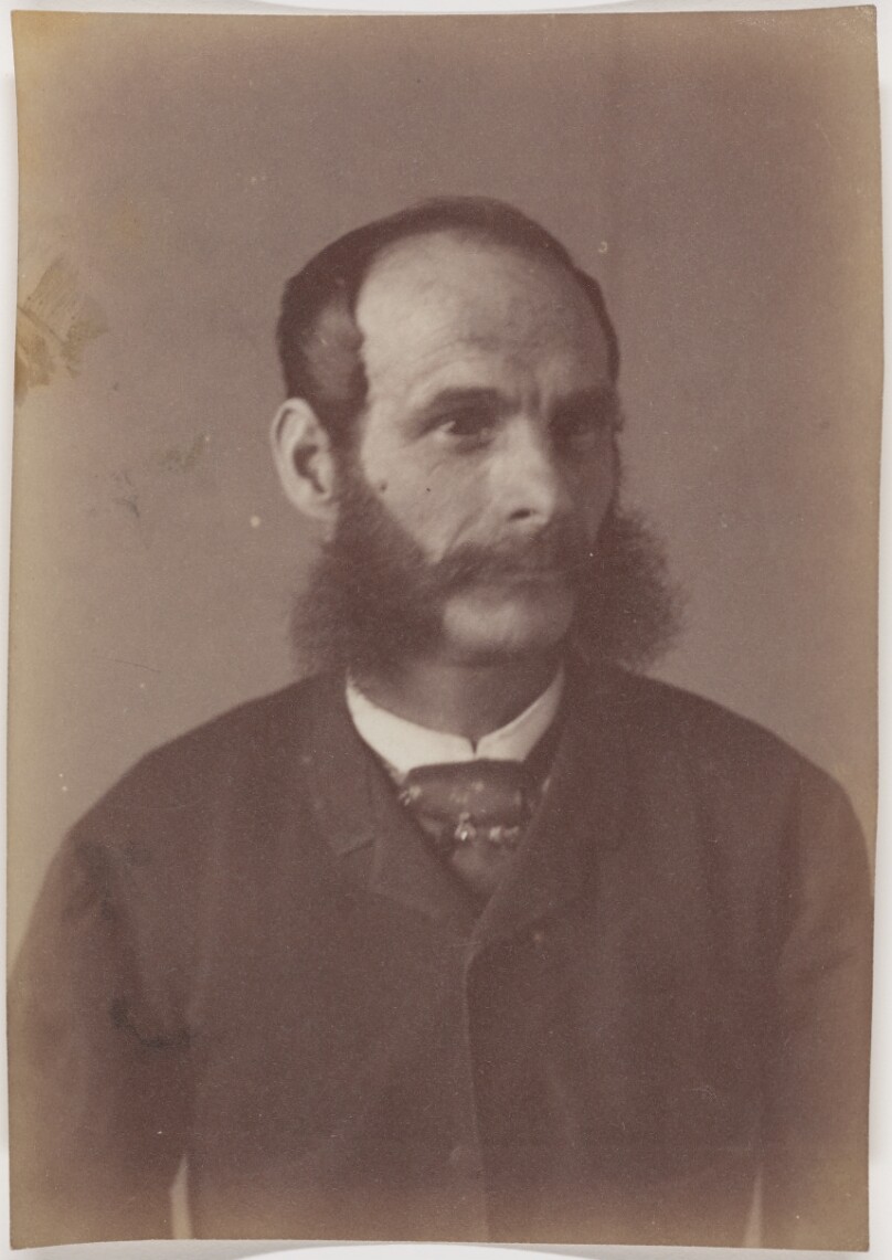 [Portrait of a man with sideburns]