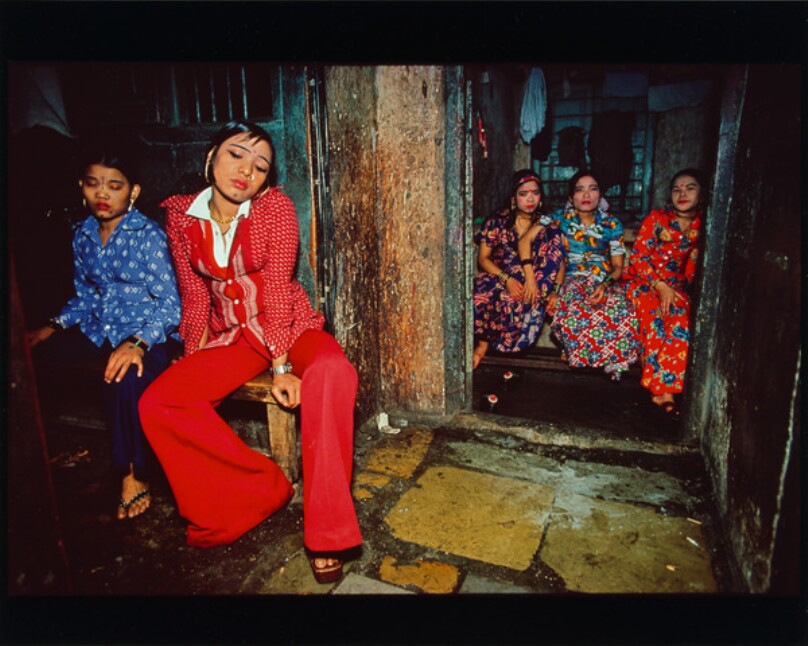 Seated Nepalese girls waiting for customers, Falkland Road, Bombay, India