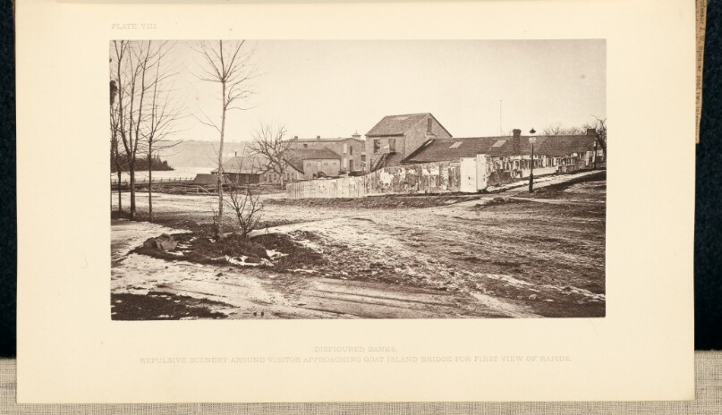 Repulsive scenery surrounding the visitior approaching Goat Island Bridge for first view of the Rapids