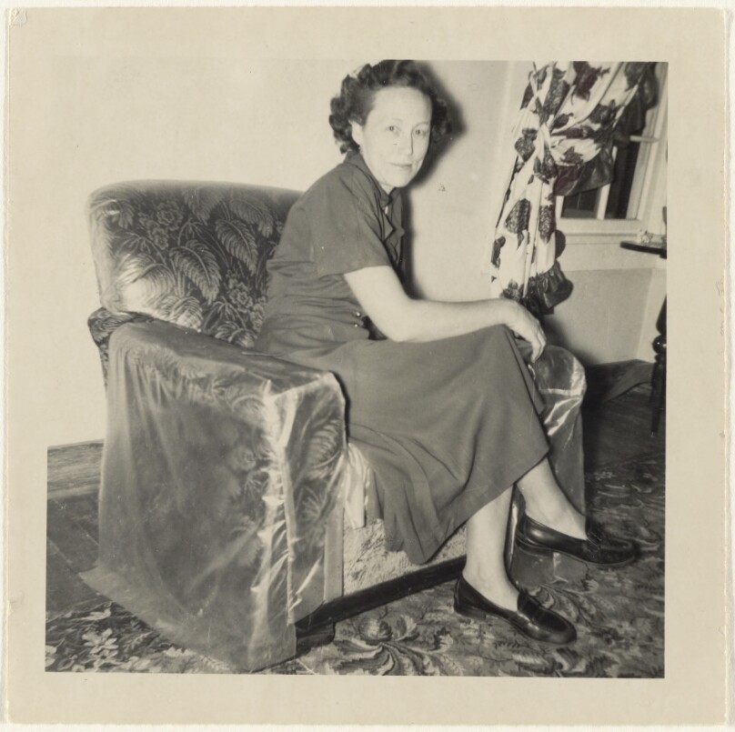 [Woman in armchair]