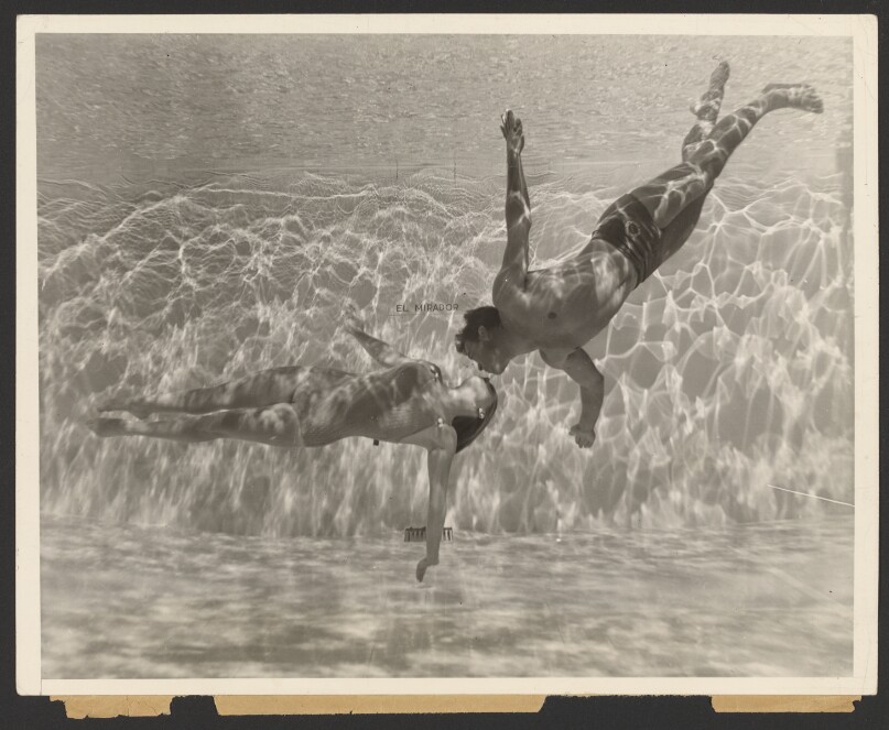 [Harold "Dutch" Smith and Marjorie Gestring kissing underwater]