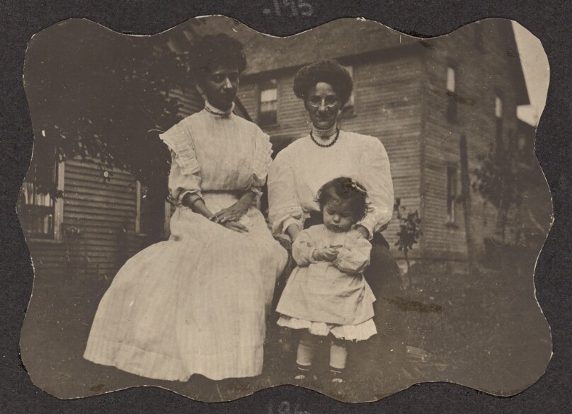 [Women with a young child]