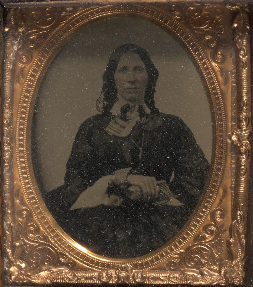 [Woman seated]