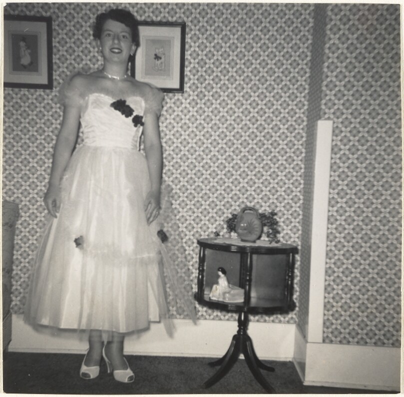 [Young woman in evening dress]