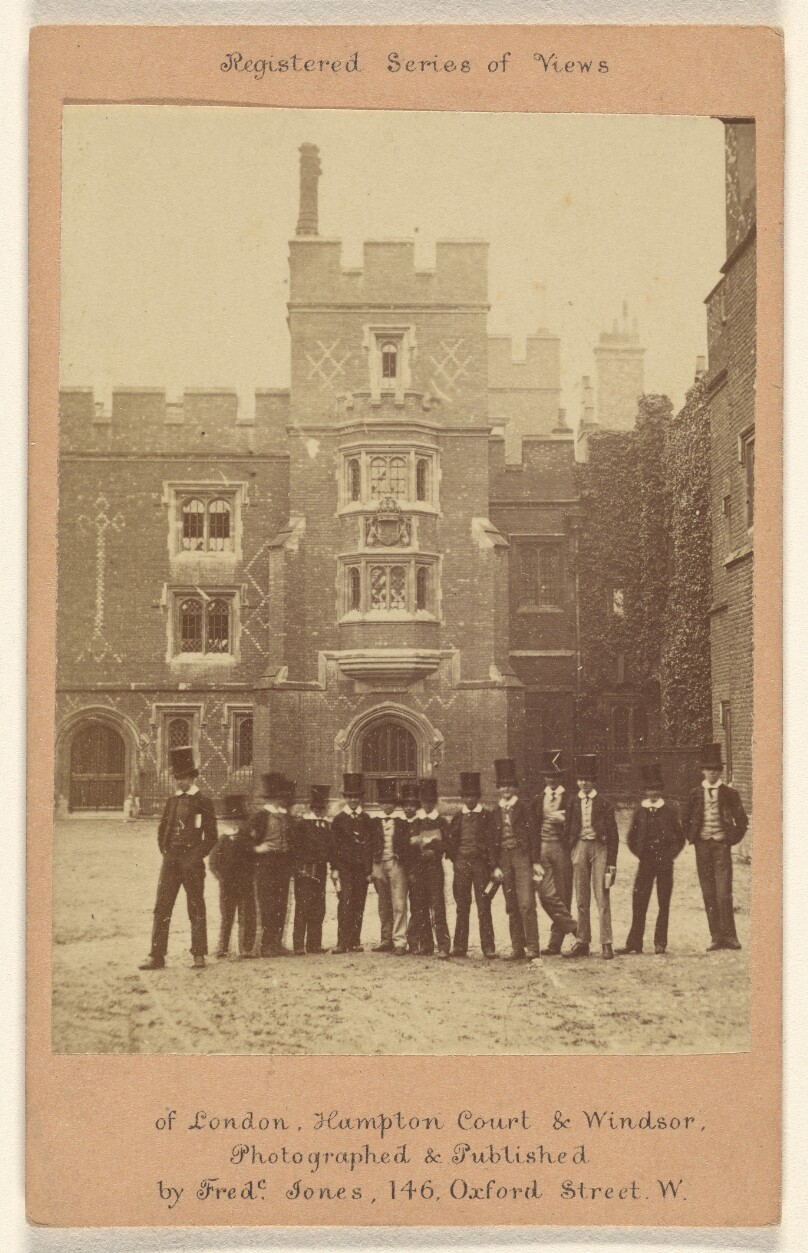 Eton College/[Group of men in top hats posing in front of Eton College, England]