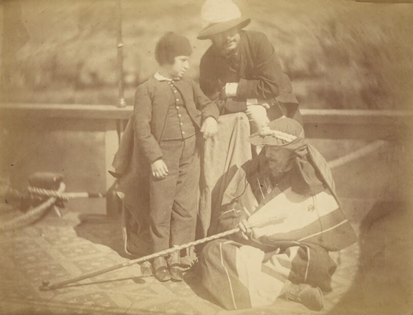 [Group Portrait of Two Occidental Men and a Boy on a Boat in the Nile River]