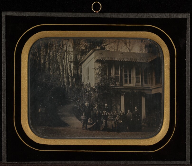 [Group portrait of twelve members of the Circle of Eynard-Lullin outside in front of his home at Beaulieu]