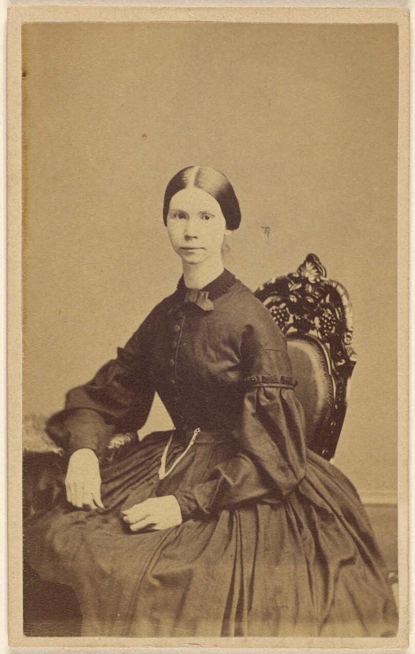 [Unidentified woman, seated]