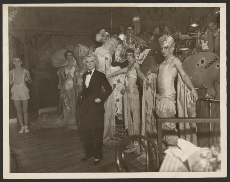 [Men and women in costume]