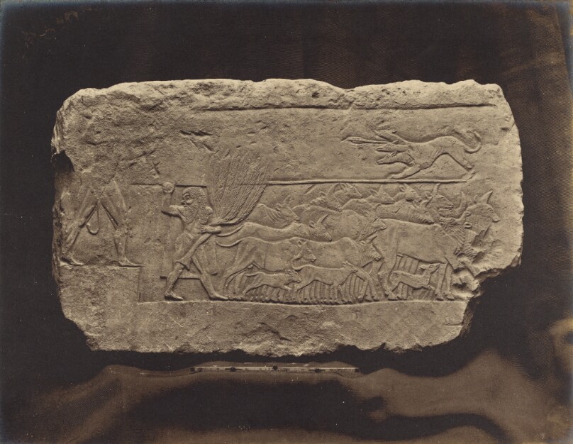 Fragment of a bas-relief from the pedestal of a Statue of Herakles, showing the lifting of the Cattle of Geryones by Herakles