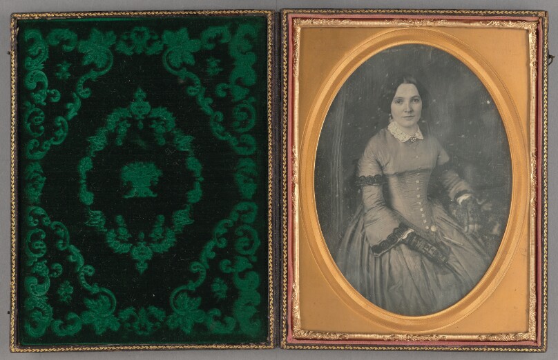 [Portrait of a Seated Well-dressed, Elegantly-looking Young Woman]