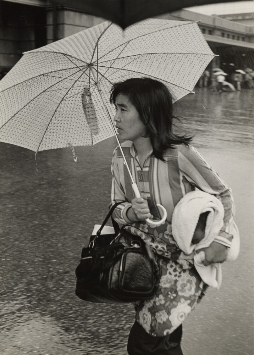 Woman with Baby and Umbrella