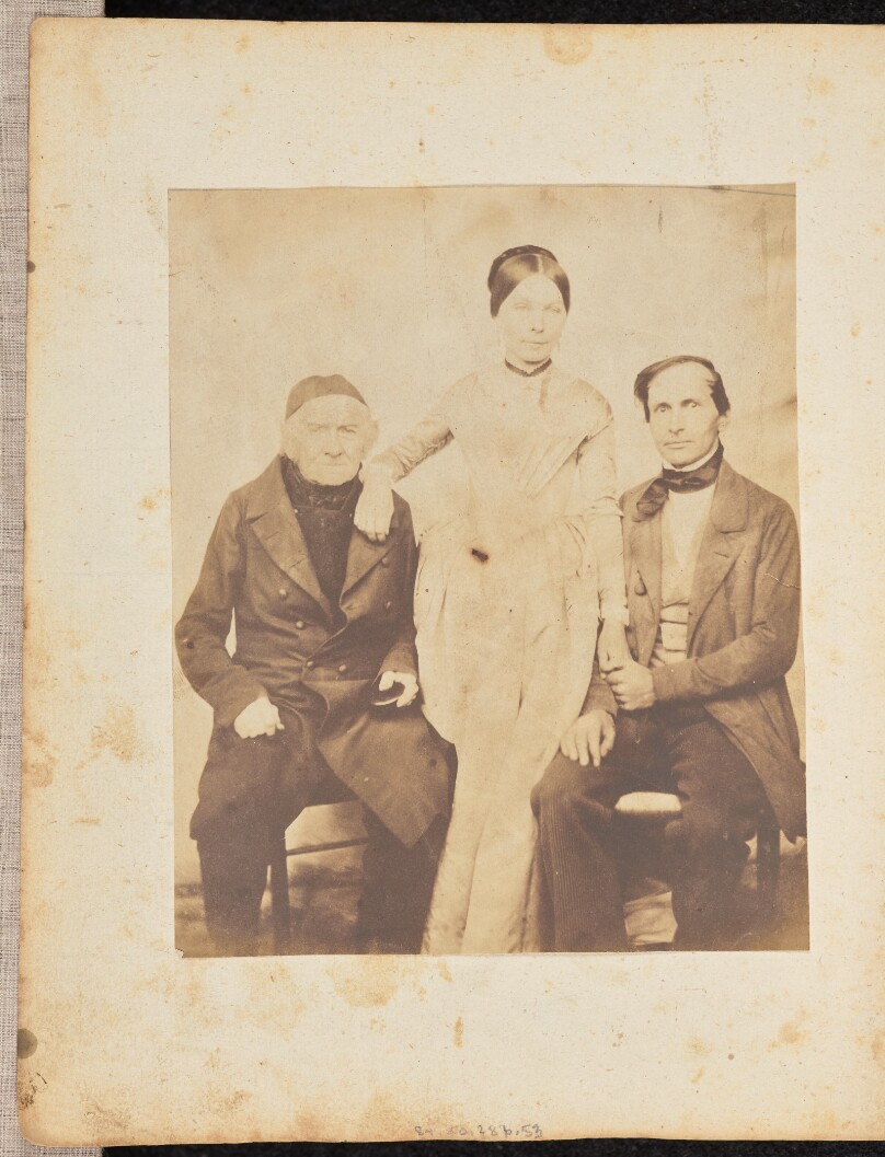 [Portrait of a woman and two men]