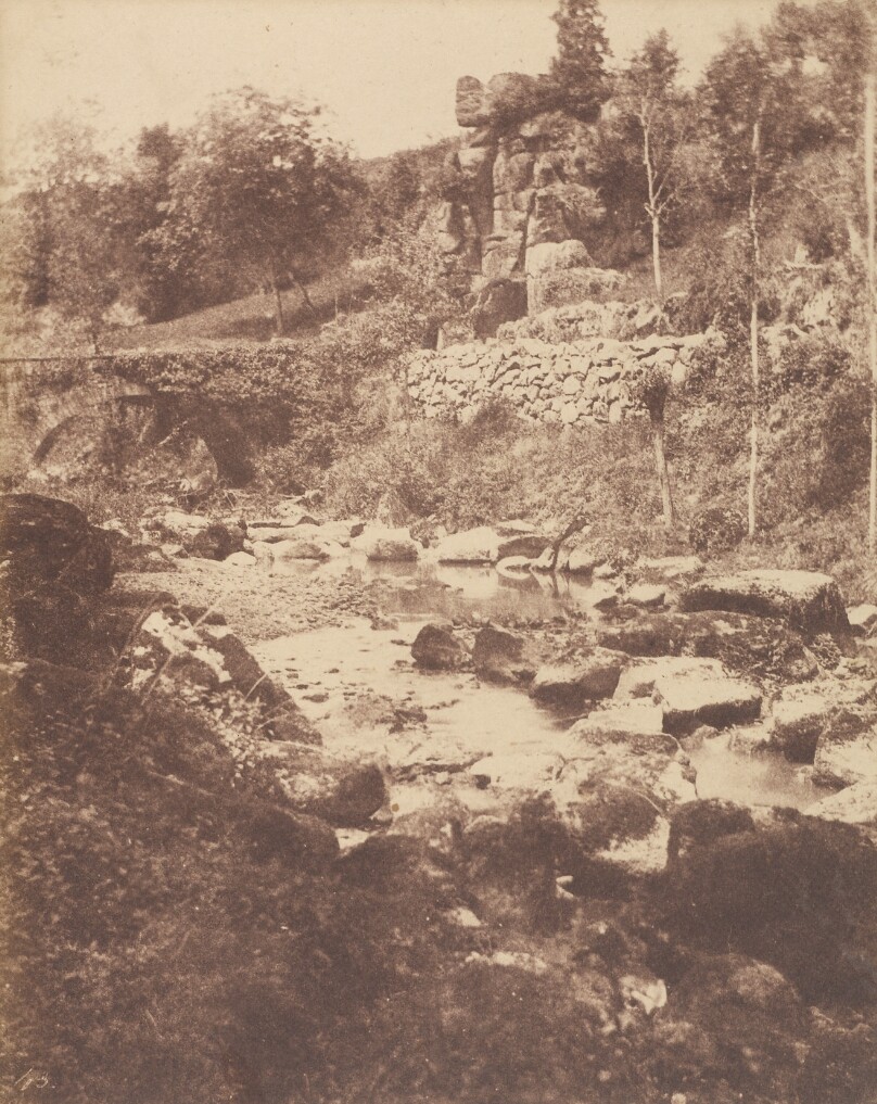 [Shallow Stream with Rocks and Stone Bridge]