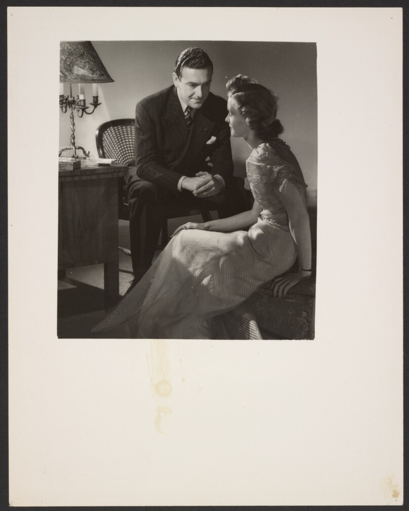[Man talking to woman]