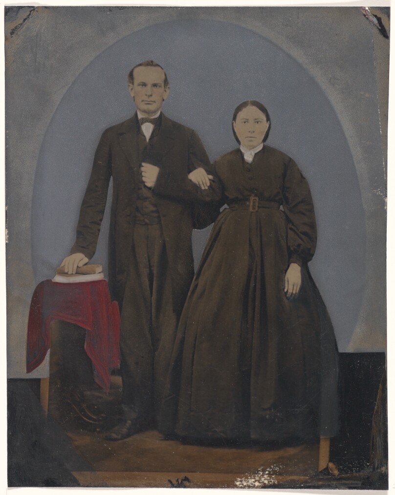 [Portrait of standing couple]