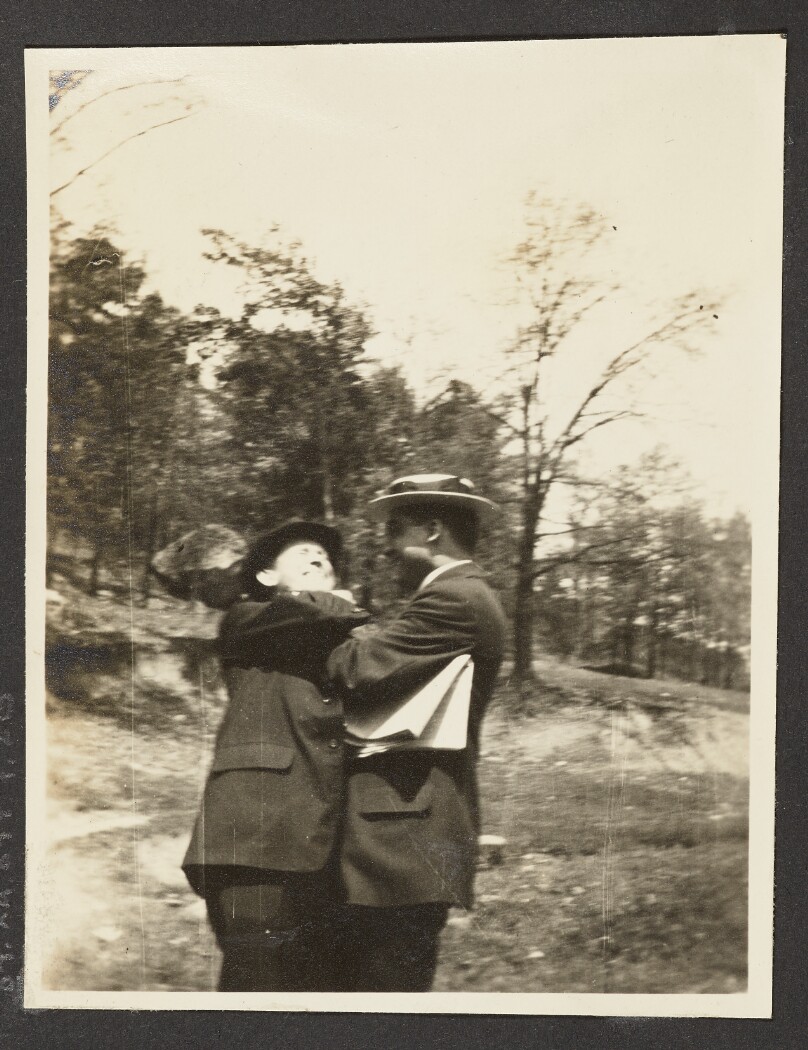 [Two Men Playing Around]