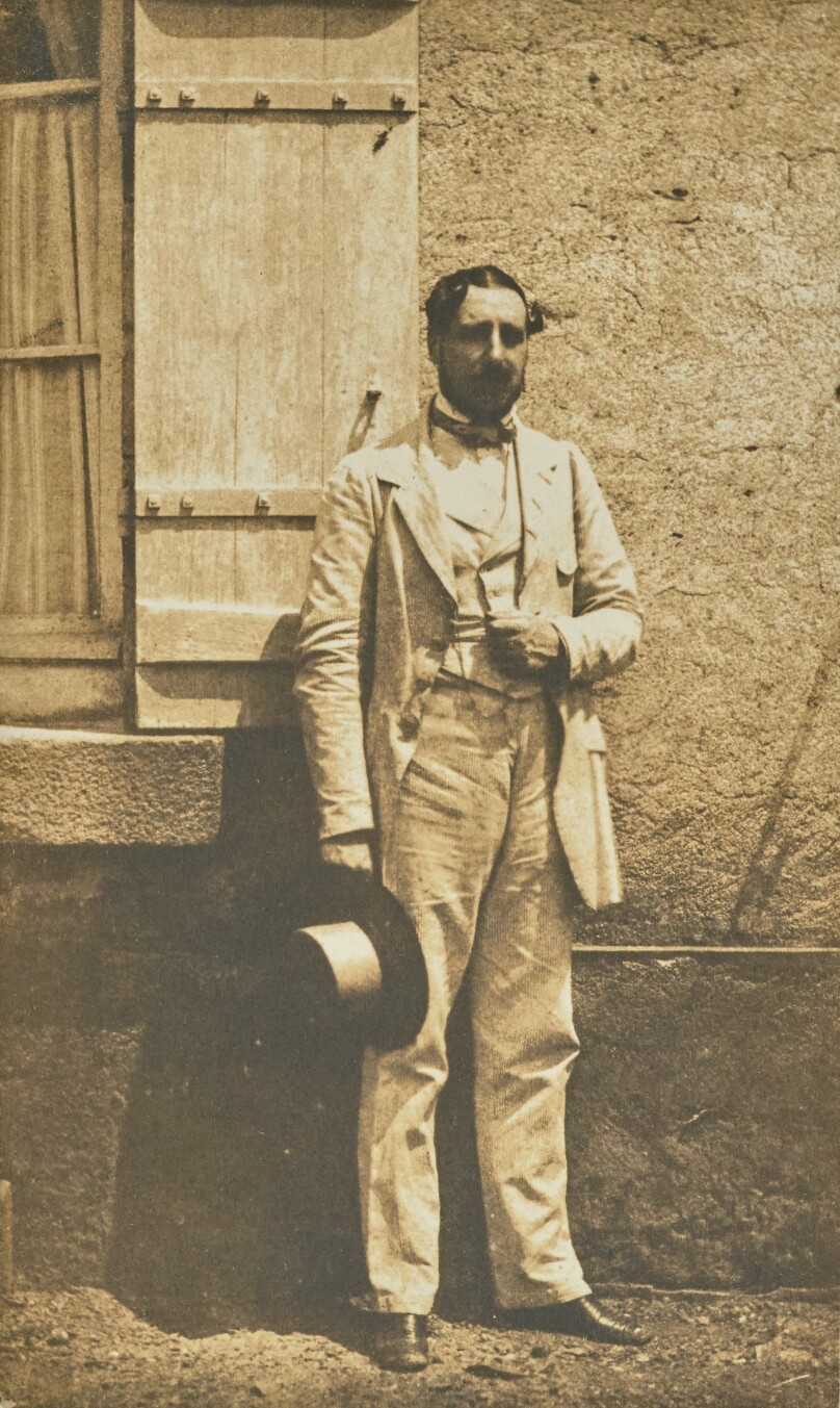[Man in a White Suit]