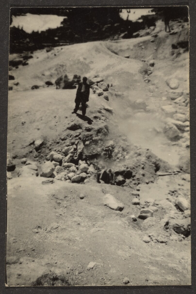[Figure in Rocky Landscape]