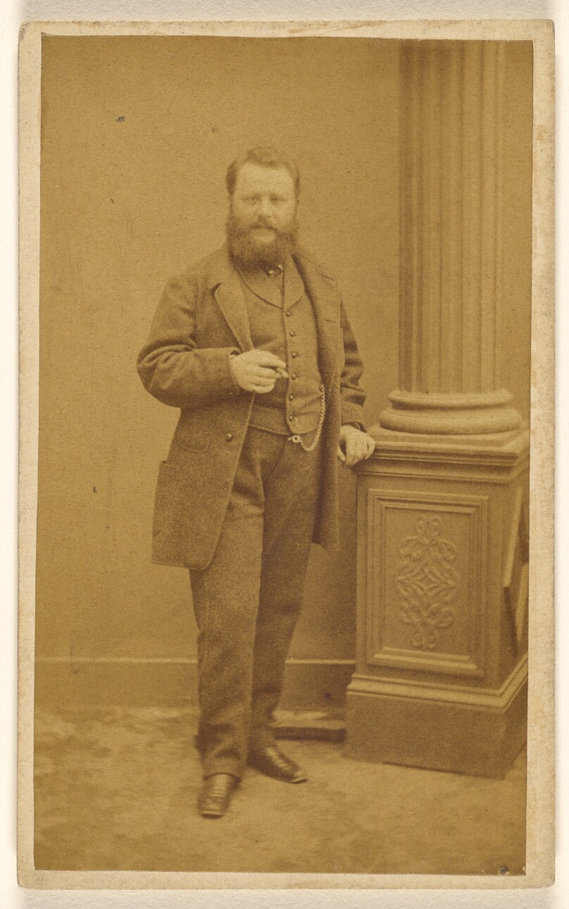 [Unidentified man with full beard, standing]