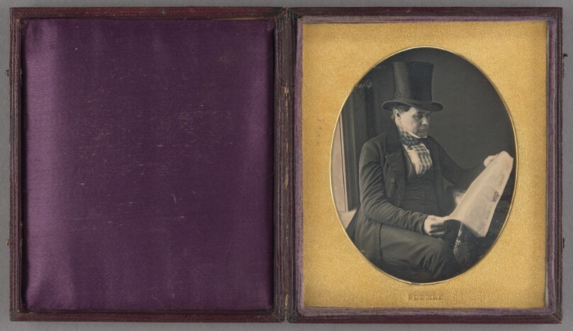 Portrait of a Man Reading a Newspaper
