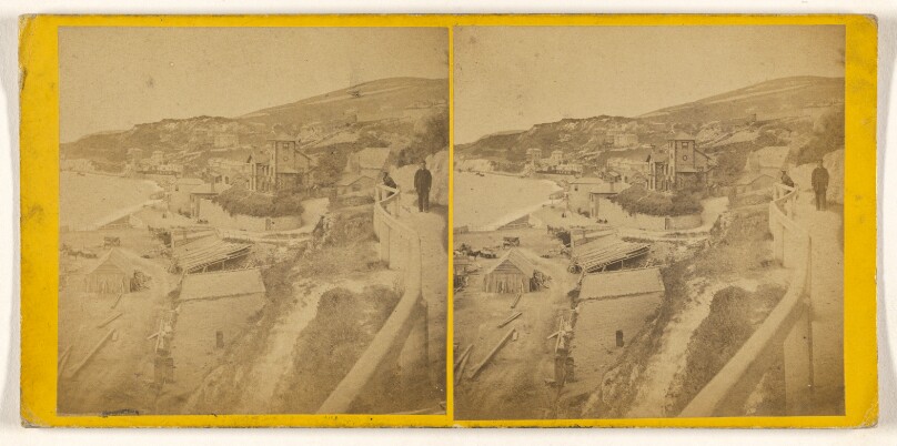 [High angle view of an unidentified coastal or river town, mill in view at bottom]