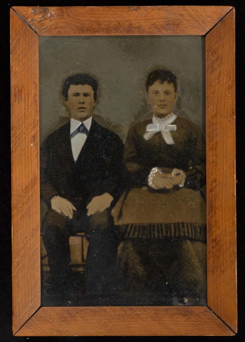 [Portrait of seated couple]