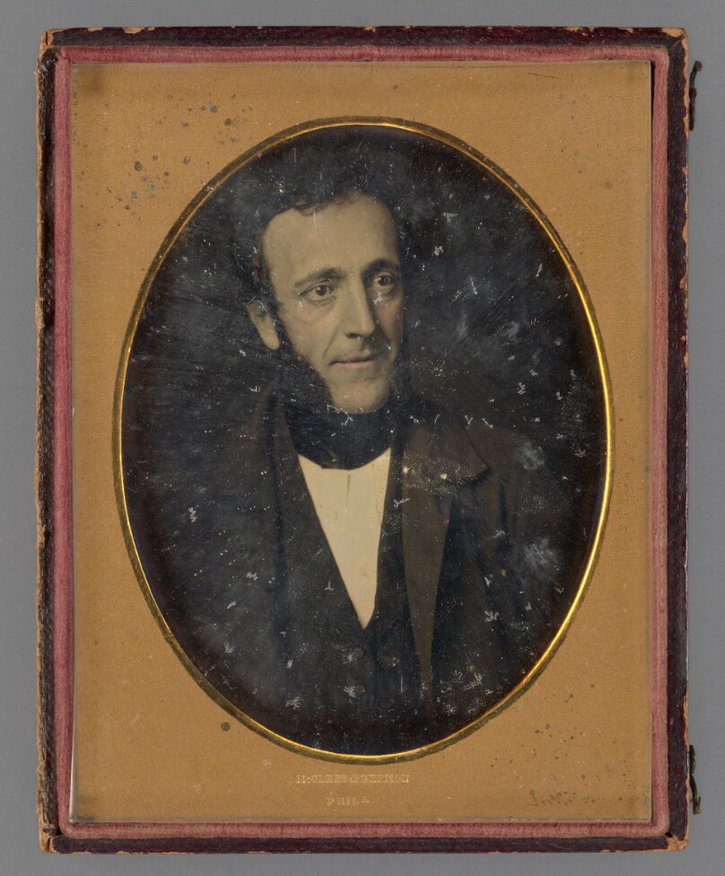 [Portrait of a man with muttonchop whiskers]