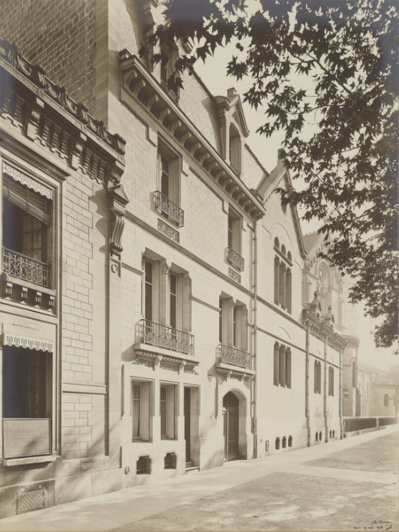 [Sidewalk with buildings]
