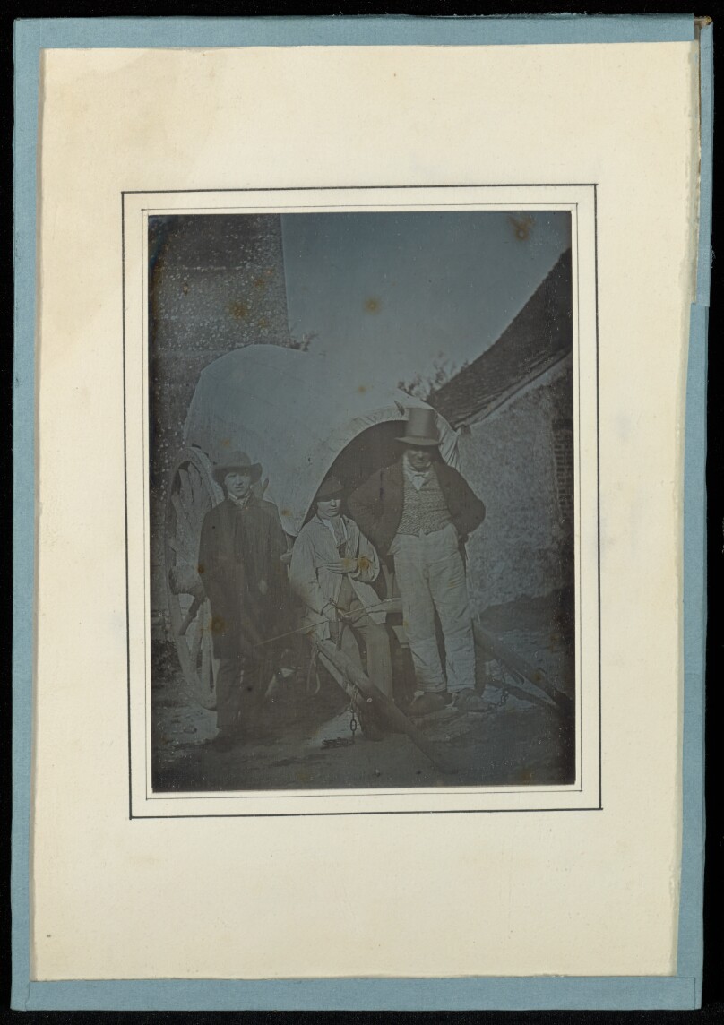 [Portrait of Two Boys and a Man]