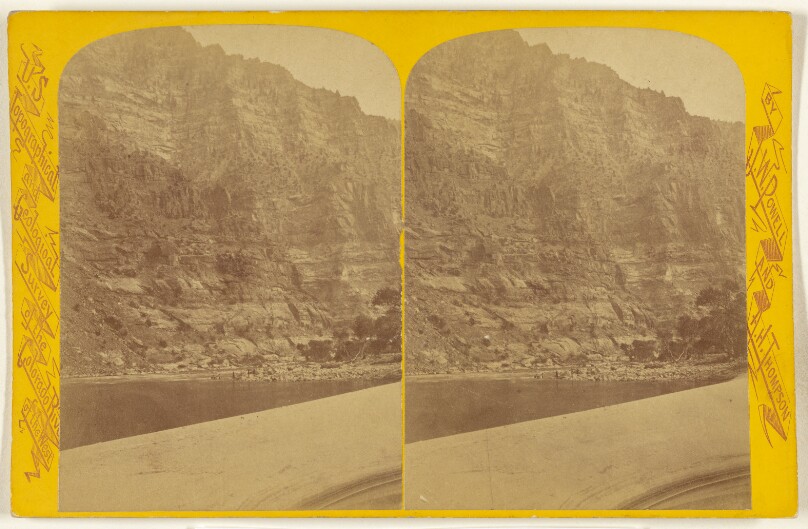 Portage at Log Cabin Cliff. This canon is 83 miles long and from 1,000 to 4,000 feet deep. [Green River. Canon of Desolation.]