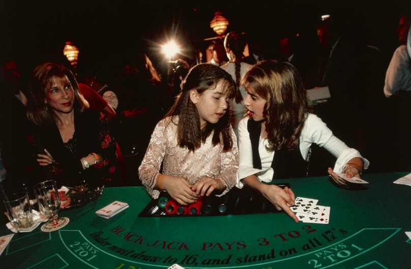 Actresses and sisters Ashley, 9, and Courtney, 12, deal blackjack at a benefit for the American Cancer Society, Universal City