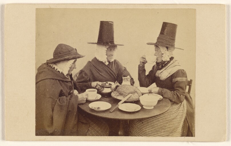 [Three Welsh ladies seated at a table having tea]