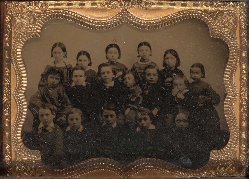 [Group portrait of seventeen children]