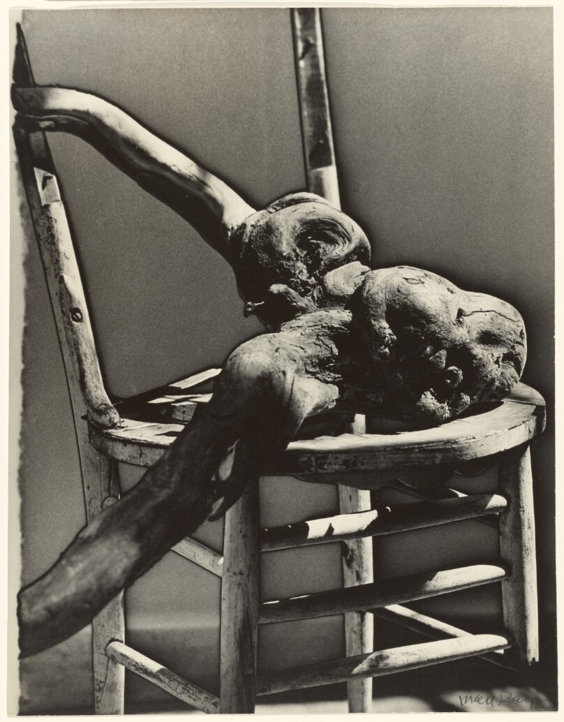 [Broken chair with stump]