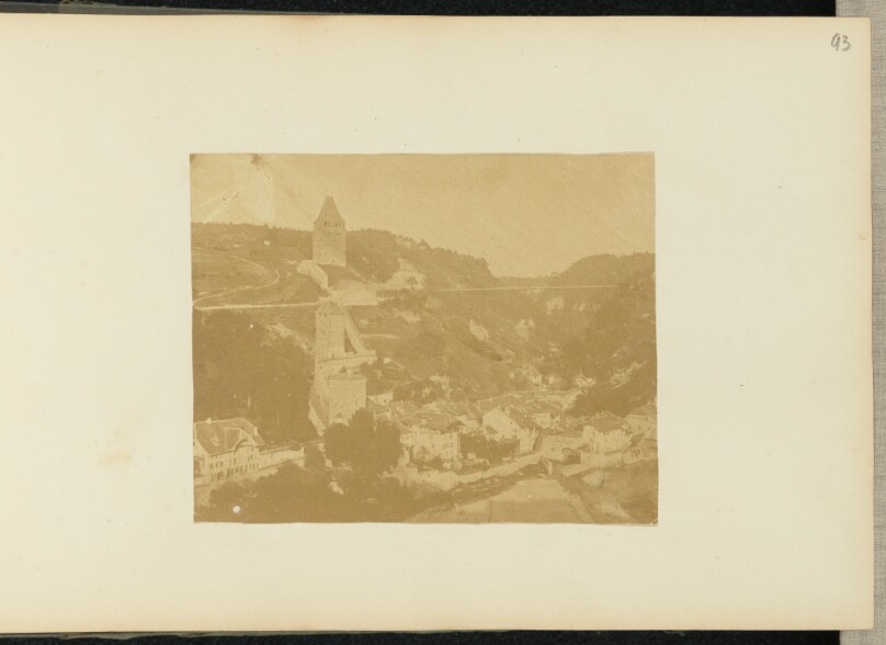 [Valley town and towers]