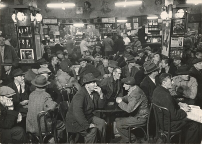 Bowery Bum of the Month: Men sitting around cafe