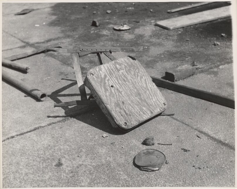 Broken Chair in Street